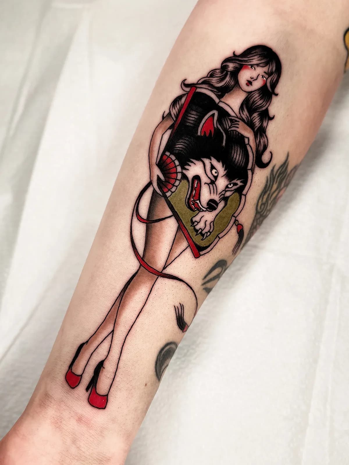 Traditional tattoo of fan lady on forearm by C.D, tattoo artist in Portland, Oregon