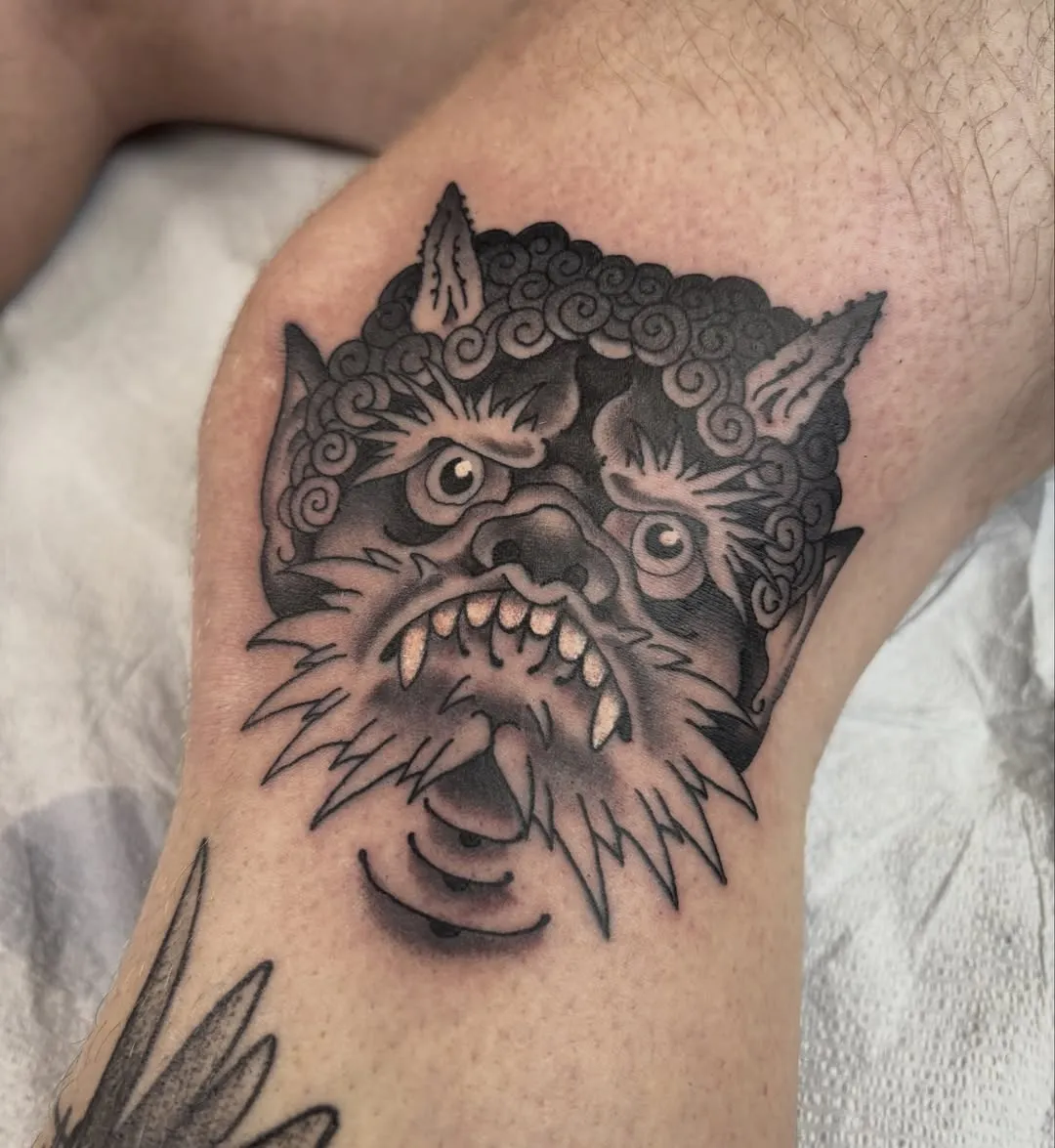 Japanese tattoo of foo dog on leg by Drat Diestler, tattoo artist in Portland, Oregon