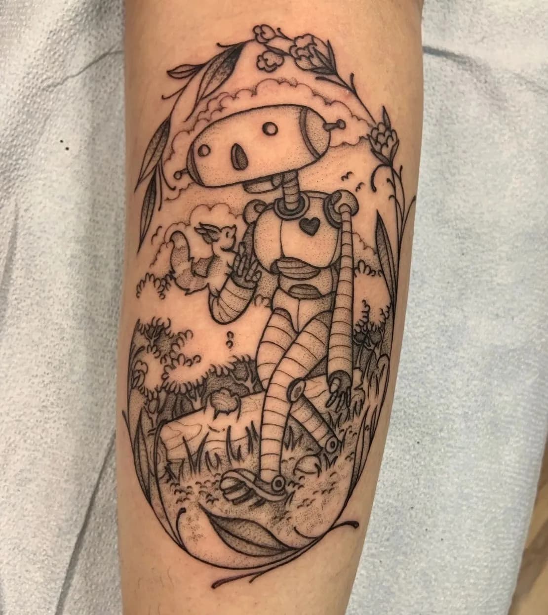 Illustrative tattoo of robot and bird by Ian McVay, tattoo artist in Portland, Oregon