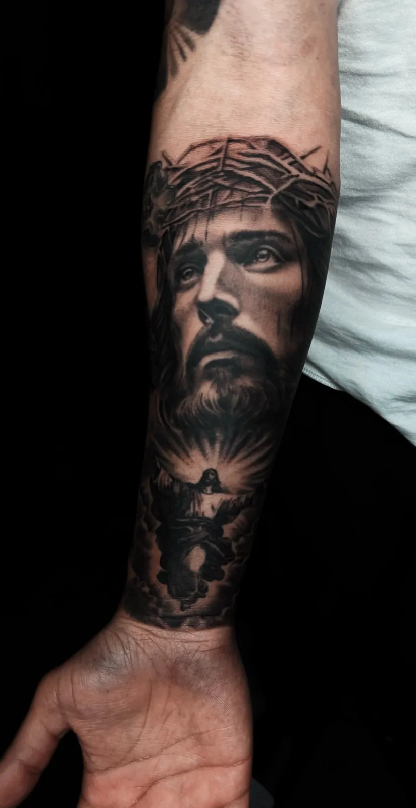Chicano tattoo of portrait on forearm by Josh Espinosa, tattoo artist in Portland, Oregon