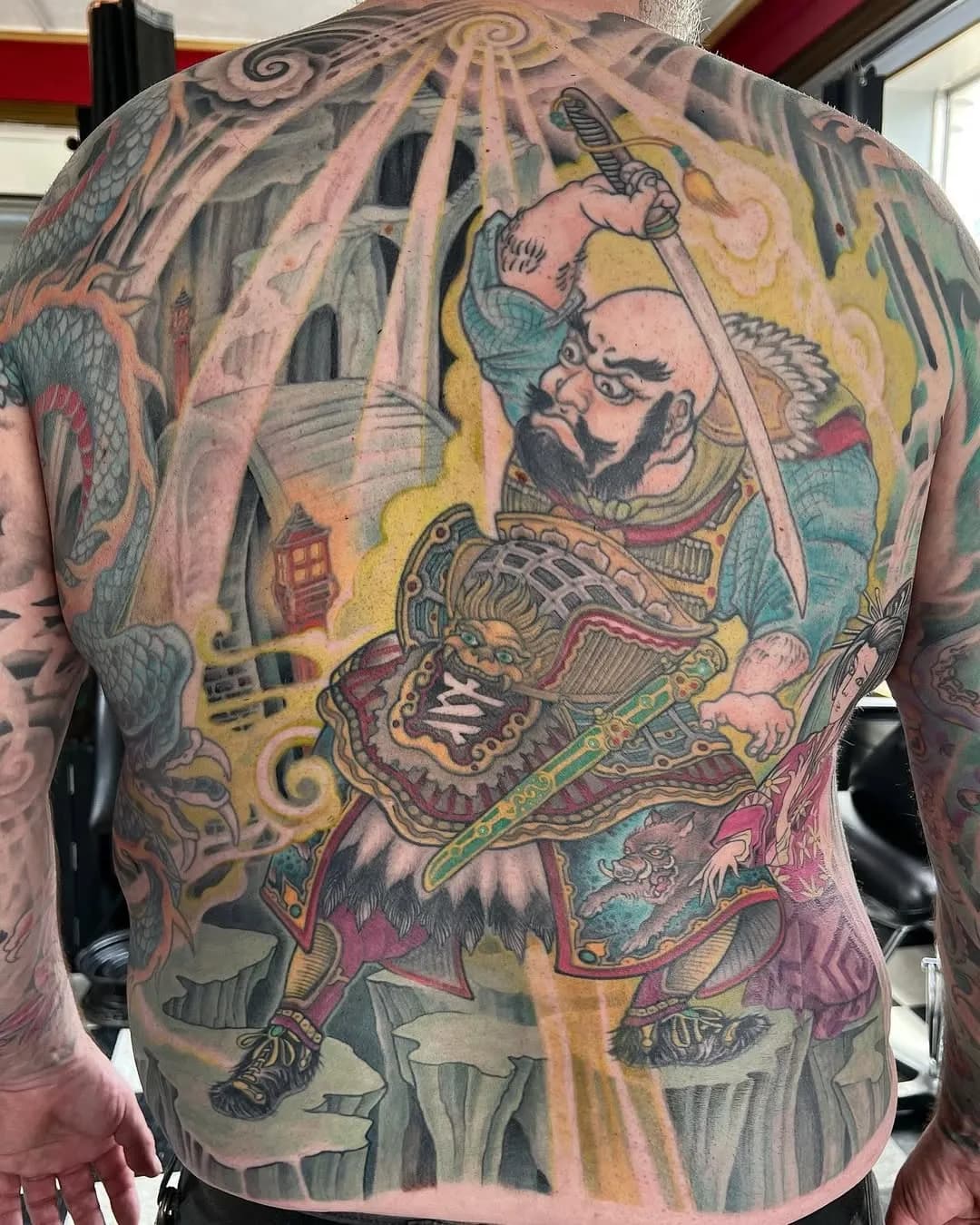 Japanese tattoo of warrior and dragon on back by Matt Reed, tattoo artist in Portland, Oregon
