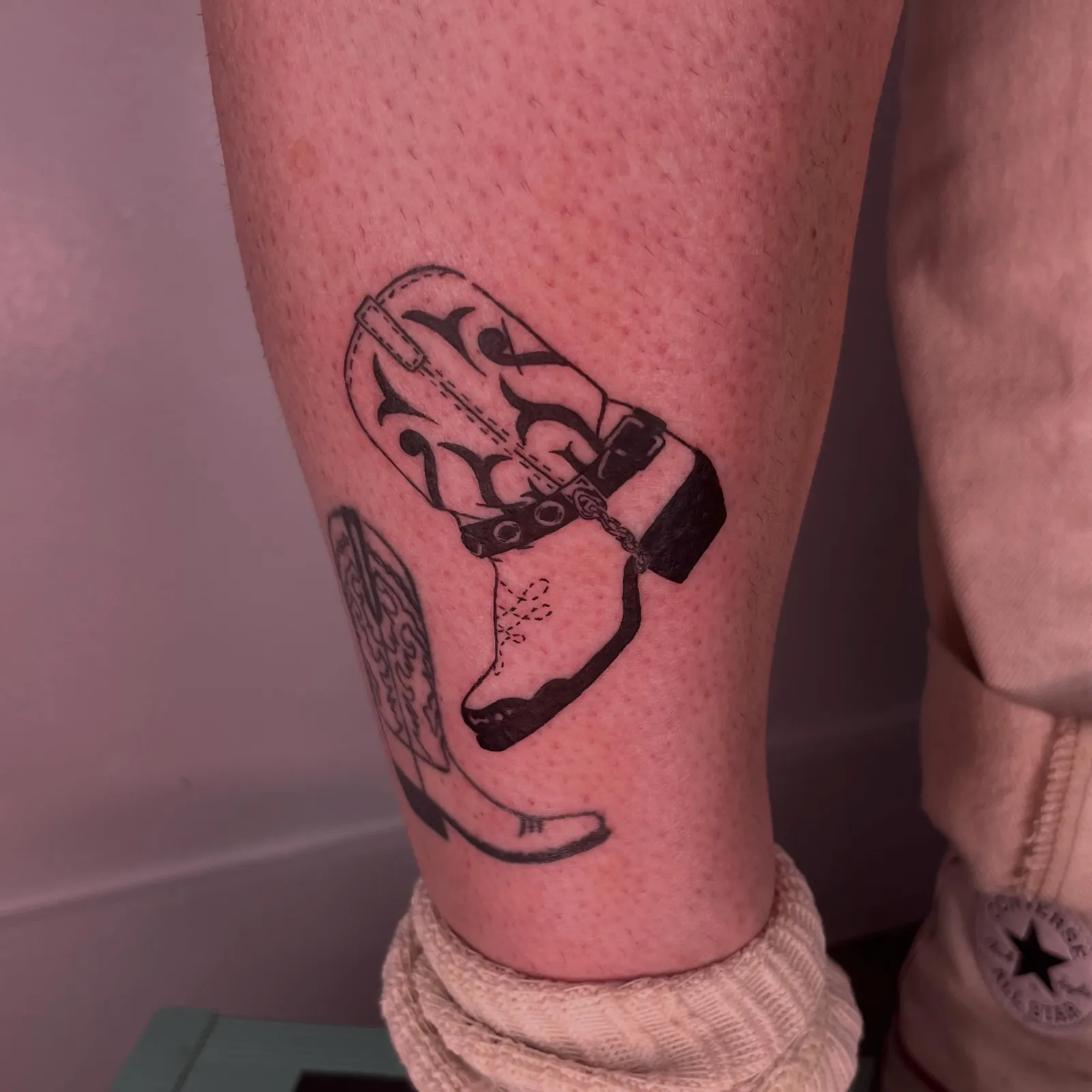Fine-line tattoo of lighter on thigh by Rae Gently, tattoo artist in Portland, Oregon
