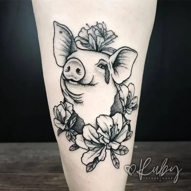 Illustrative tattoo of pig and flowers on forearm by Ruby Gore, tattoo artist in Portland, Oregon