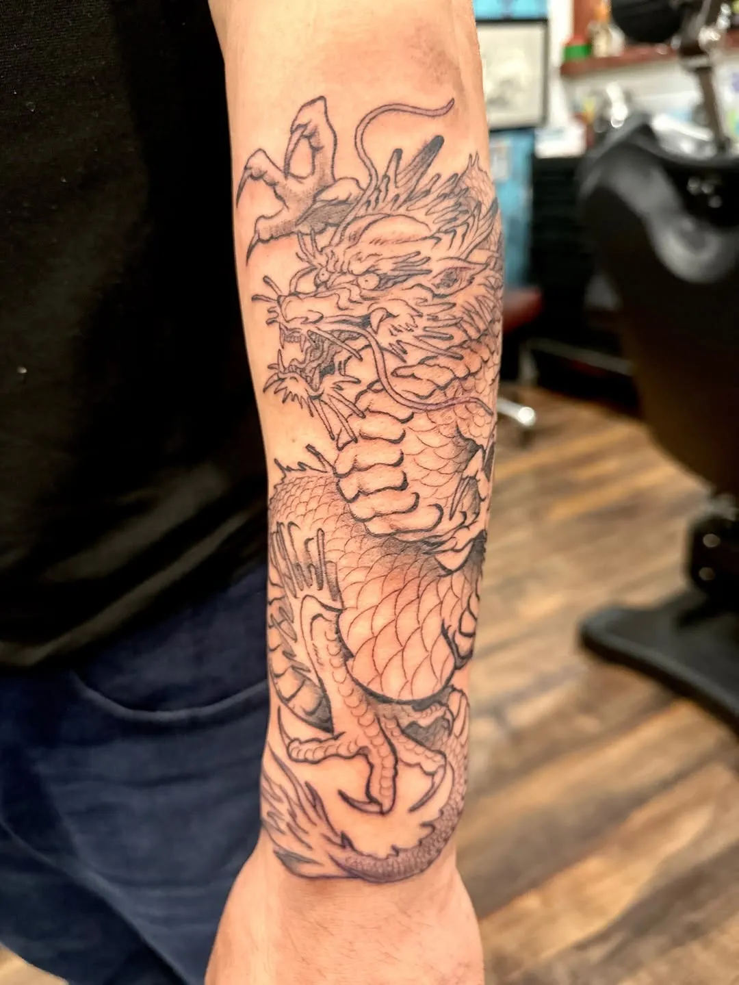 Japanese tattoo of dragon on forearm by Viet Nguyen, tattoo artist in Portland, Oregon